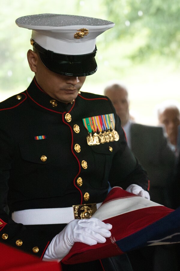 U.S. Marine Gunnery Sgt. Daniel Sok, Aviation Ordnance Chief, with Marine Aircraft Group-41 folds the flag at the funeral of retired Lt. Gen. Richard E. Carey at Dallas-Fort Worth National Cemetery in Dallas, Texas, May 5, 2025. 



Carey served 38 years in the Marine Corps, serving in both the Korean and Vietnam War. Near the end of his service, Carey led the efforts of Operation Frequent Wind, the final phase in evacuation of American Forces from Saigon City, Vietnam, marking the end of U.S. involvement in the Vietnam War. After his service, Carey continued to help serve his community in different ways, such as participating in the creation of a national monument honoring those who served in the Battle of the Chosin Reservoir and assisting in the construction of the Dallas-Fort Worth National Cemetery. (U.S. Marine Corps photo by Cpl. Isaiah W. Smith)