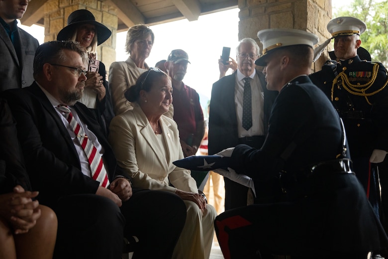 U.S. Marine Corps Lt. Gen. Leonard F. Anderson IV, commander of Marine Forces Reserve and Marine Forces South, presents a flag to Tamara, the eldest daughter of Lt. Gen. Richard E. Carey, at his funeral at Dallas-Fort Worth National Cemetery in Dallas, Texas, May 5, 2025. 



Carey served 38 years in the Marine Corps, serving in both the Korean and Vietnam War. Near the end of his service, Carey led the efforts of Operation Frequent Wind, the final phase in evacuation of American Forces from Saigon City, Vietnam, marking the end of U.S. involvement in the Vietnam War. After his service, Carey continued to help serve his community in different ways, such as participating in the creation of a national monument honoring those who served in the Battle of the Chosin Reservoir and assisting in the construction of the Dallas-Fort Worth National Cemetery. (U.S. Marine Corps photo by Cpl. Isaiah W. Smith)