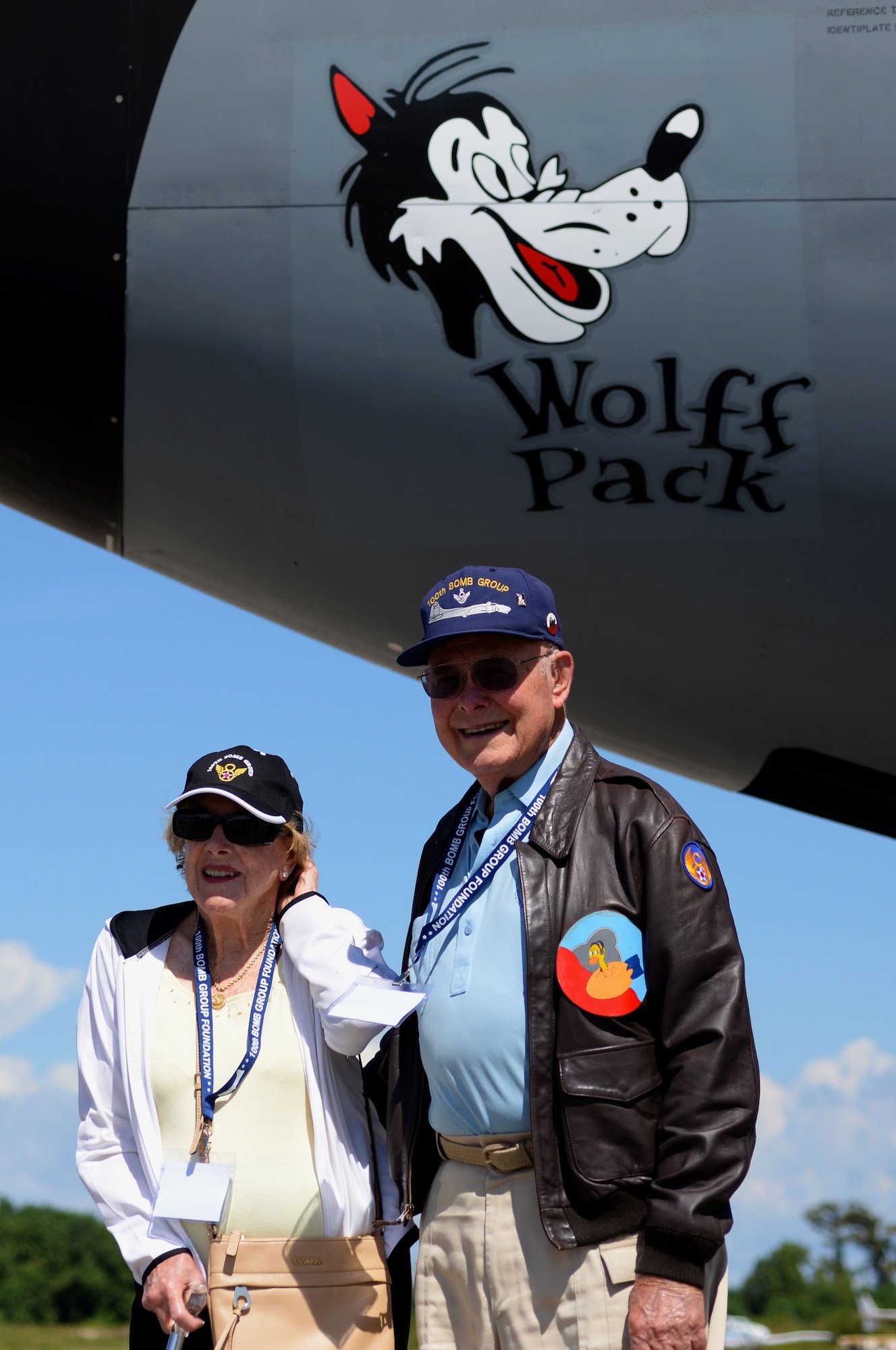 World War II and 100th Bomb Group veteran Capt. Robert “Bob” Wolff, right, poses with his wife Barbara, underneath the Wolff Pack nose art on a KC-135 Stratotanker assigned to RAF Mildenhall, England, at a static display during the 100th Bomb Group reunion at Louis Armstrong New Orleans International Airport in New Orleans, La., Sept. 24, 2015. Bob was a B-17 Flying Fortress pilot with the 100th BG, stationed at Thorpe Abbots, England, during World War ll. (U.S. Air Force photo by Senior Airman Victoria H. Taylor)