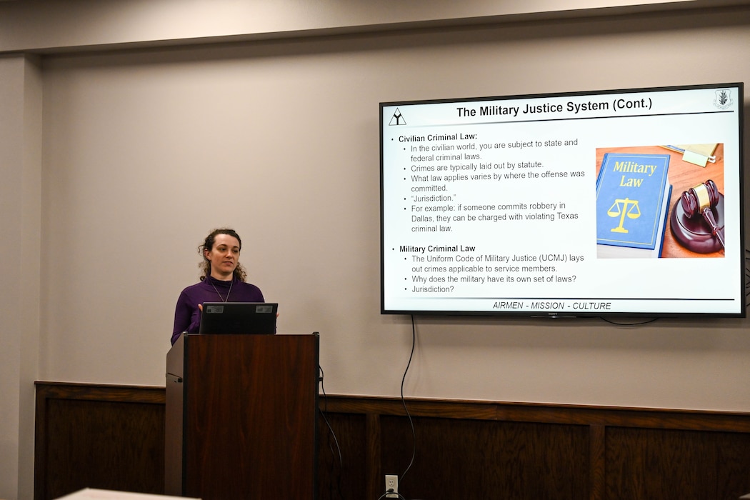 Rachel Whalen, 97th Air Mobility Wing Judge Advocate flight attorney advisor, gives a briefing during Law Week at Altus Air Force Base, Oklahoma, May 2, 2025. The week began with a workshop for senior non-commissioned officers to learn how to guide their Airmen on available legal resources. (U.S. Air Force photo by Airman 1st Class Lauren Torres)