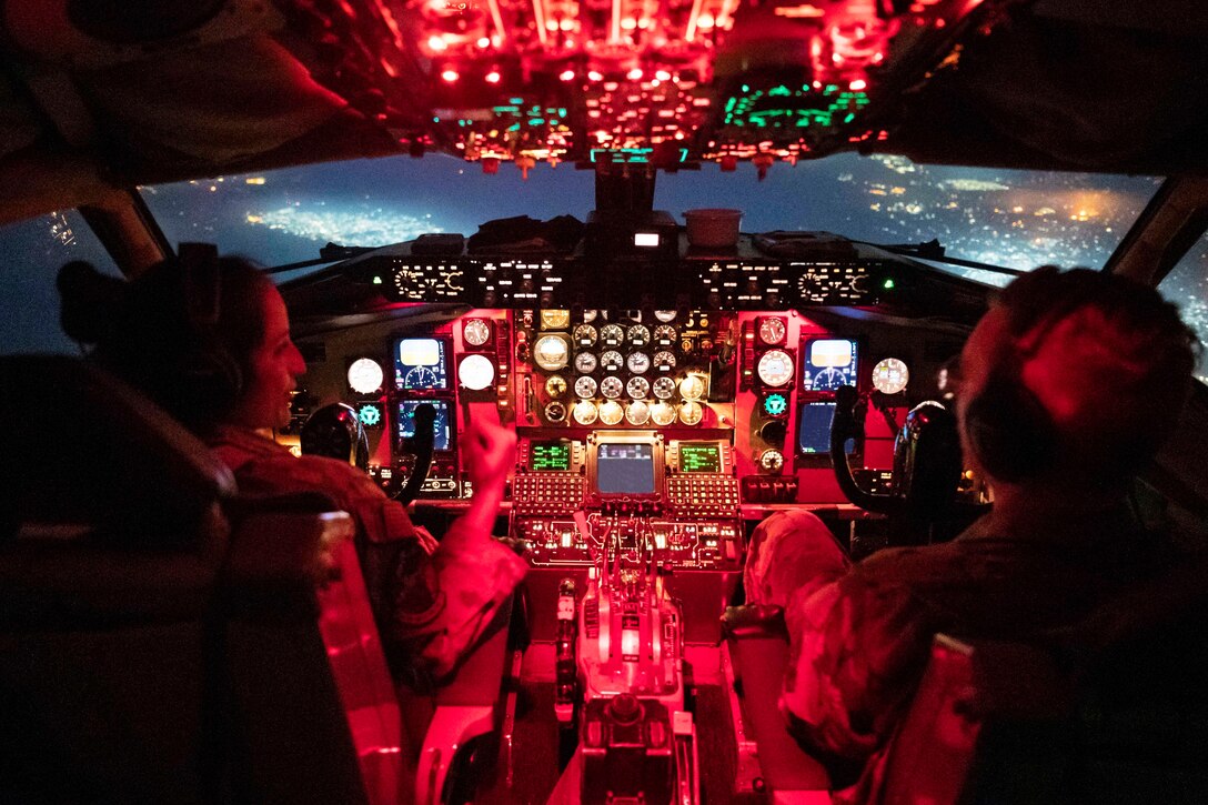 U.S. Air Force Capt. Katleen Ybarra, and 1st Lt. Logan Pethtel, 91st Expeditionary Air Refueling Squadron KC-135 Stratotanker pilots fly during a combat aerial refueling mission within the U.S. Central Command area of responsibility, Dec. 30, 2022.
