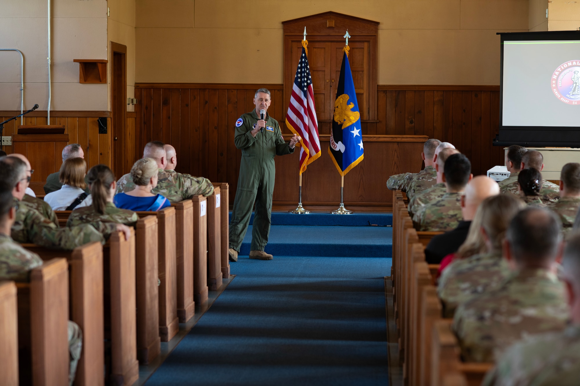 Chief of the National Guard Bureau, Gen. Steven Nordhaus addresses the men and women of the 142nd Wing during a town hall held in the chapel at Portland Air National Guard Base, Ore., April 30, 2025. During his visit, Nordhaus recognized outstanding Airmen and experienced the power and capability of the F-15EX firsthand. (U.S. Air National Guard photo by Master Sgt. Steph Sawyer)