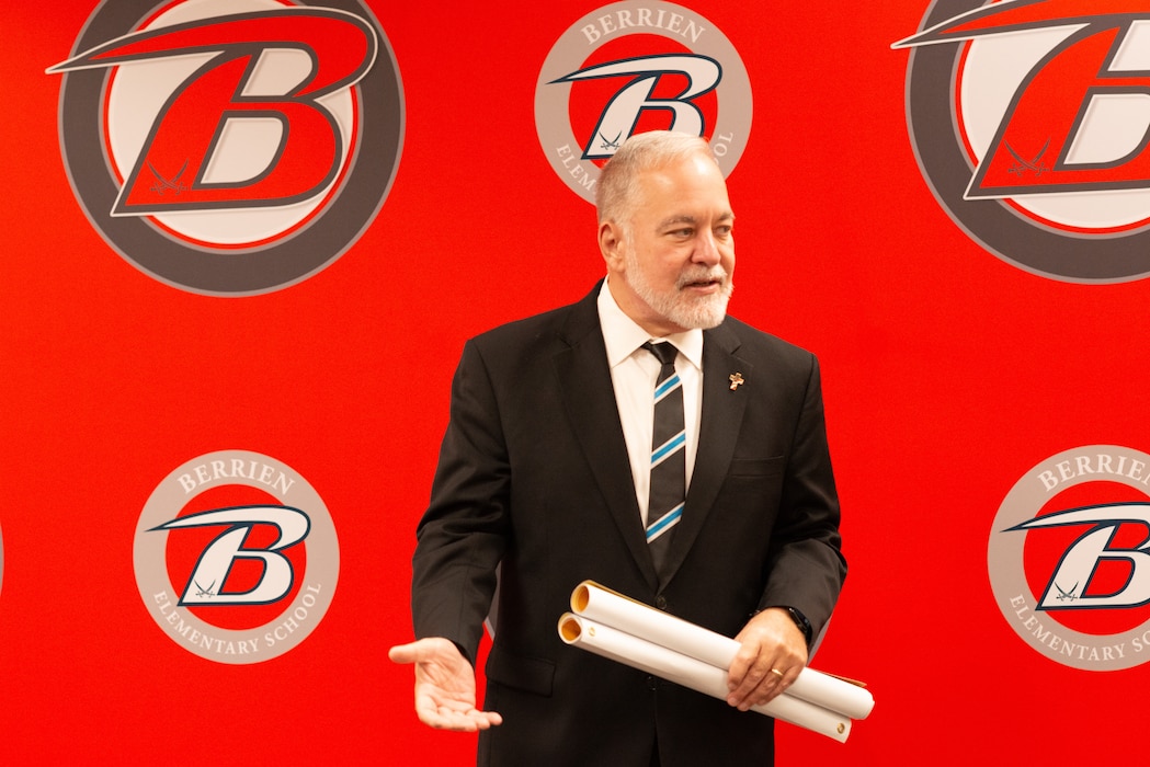 Representative gives speech at award ceremony.