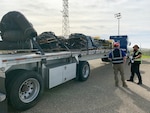 Transportation specialists prepare to ship materials removed from a deactivated Vandenberg Space Force Base Minuteman III launch facility to the Defense Logistics Agency’s demilitarization center