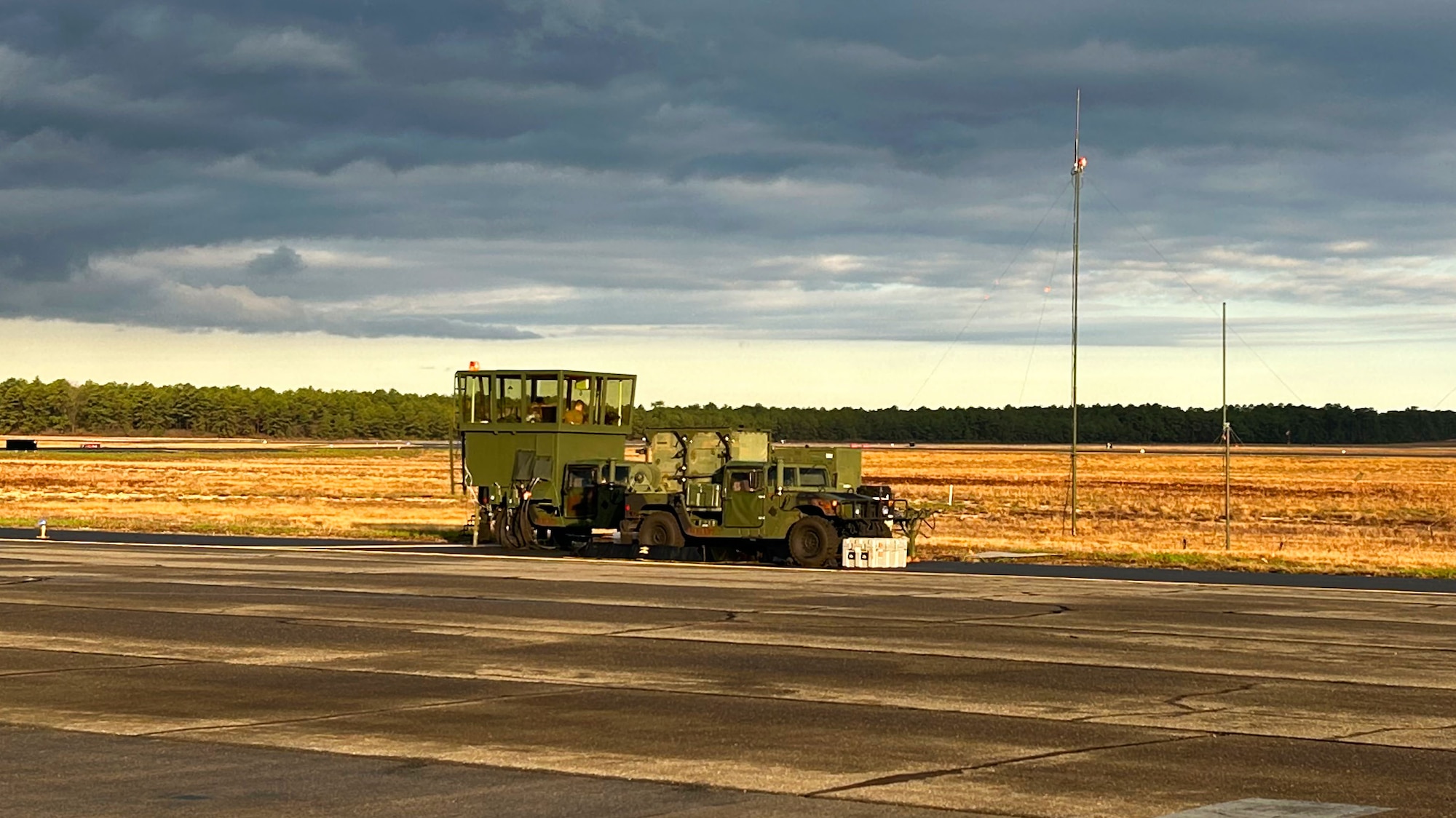 The Mobile Special Navigational Aid-7 tower is deployed and undergoes pre-operational inspection at Lakehurst’s Maxwell Field at Joint Base McGuire-Dix-Lakehurst, N.J., April 7, 2025. In a display of Total Force Integration, active-duty Airmen, Sailors and Air National Guard teams successfully deployed and activated the MSN-7 tower at Lakehurst’s Maxwell Field while the main tower underwent refurbishment allowing for uninterrupted support to mission readiness and operational capability. (U.S. Air Force photo by Monty Crawford)