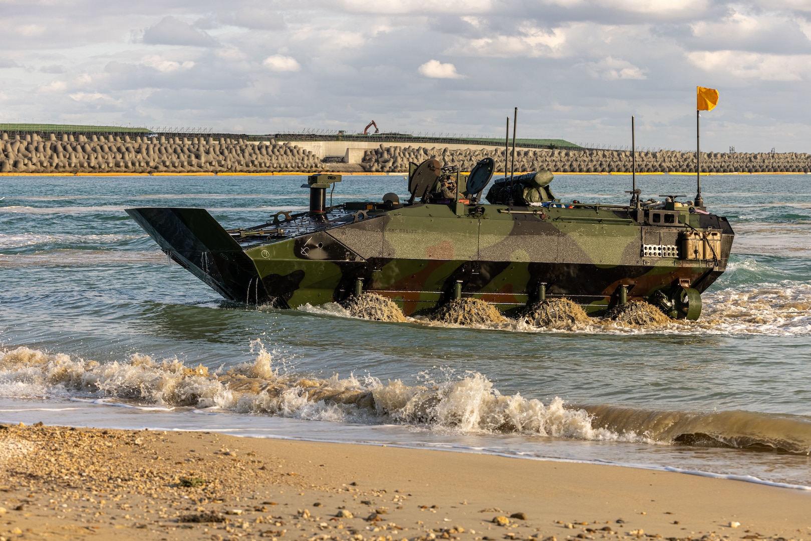 Marines operate an amphibious vehicle in the water