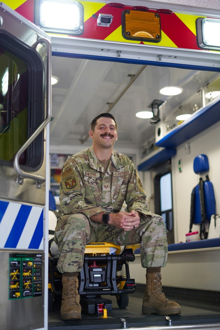 Paramedic Staff Sgt. Kenneth McIntyre sits inside an ambulance at Mike O'Callaghan Military Medical Center