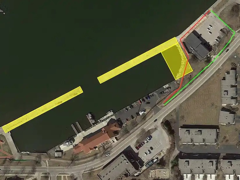The U.S. Army Corps of Engineers, Detroit District construction to replace timber fenders on the East and West Government Basin Piers in Grand Haven begins May 19, 2025. The red pathway notes the closed pedestrian walkway, while the green line notes the alternative route during construction. The yellow rectangle denotes the East and West Government Basin construction zone. (U.S. Army Corps of Engineers graphic)