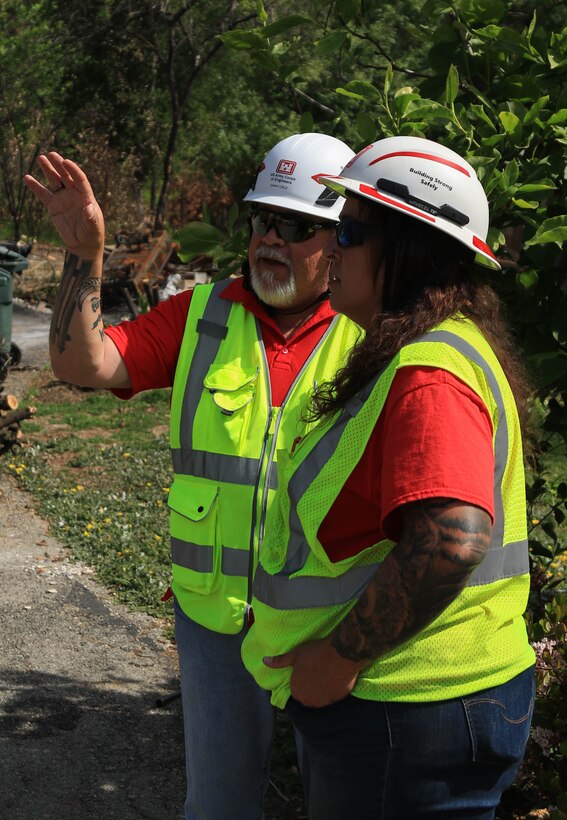 Quality Assurance Supervisor Tiffany Natvidad, Tulsa District employee, left, discusses potential site risks with Quality Assurance Danny Cruz, and Galveston District engineering technician. Both are deployed in response to the Southern California wildfires.

USACE is working in partnership with local, state and the Federal Emergency Management Agency in response to the Southern California Wildfires.