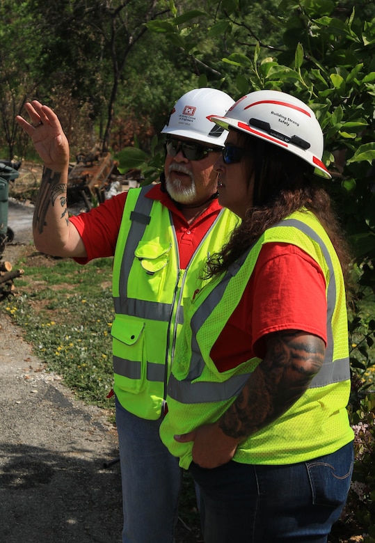 Quality Assurance Supervisor Tiffany Natvidad, Tulsa District employee, left, discusses potential site risks with Quality Assurance Danny Cruz, and Galveston District engineering technician. Both are deployed in response to the Southern California wildfires.

USACE is working in partnership with local, state and the Federal Emergency Management Agency in response to the Southern California Wildfires.
