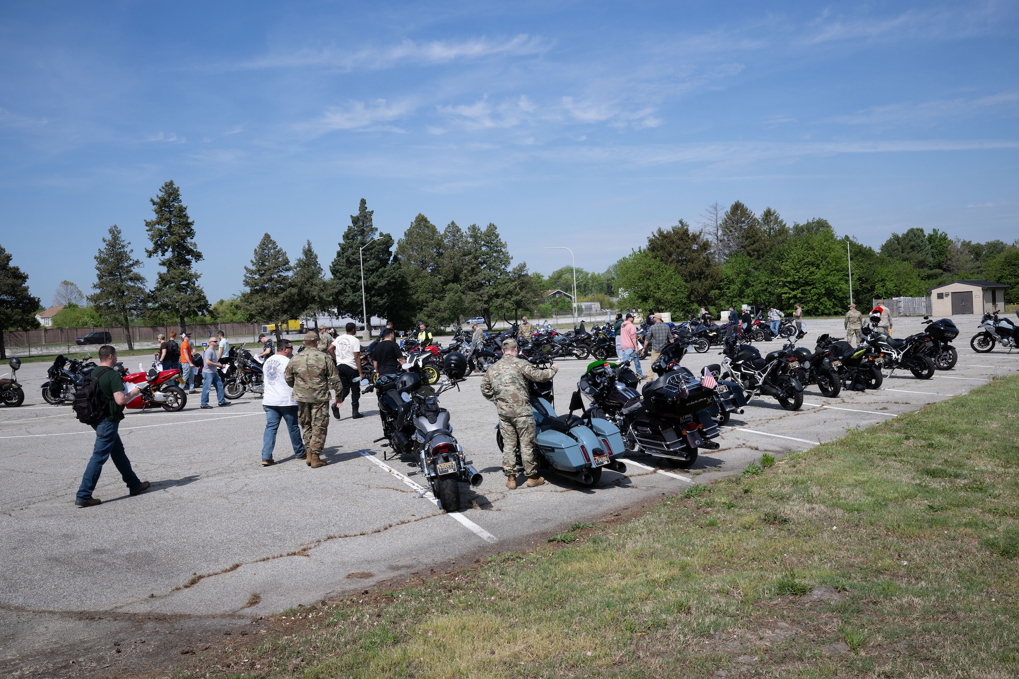 Members of Team Dover conduct a 54 point motorcycle pre-ride inspection during the annual Motorcycle Safety Day at Dover Air Force Base, Delaware, May 2, 2025. The event featured pre-season safety briefs and mentorship ride from Dover AFB to Lewes, Del. (U.S. Air Force photo by Mauricio Campino)