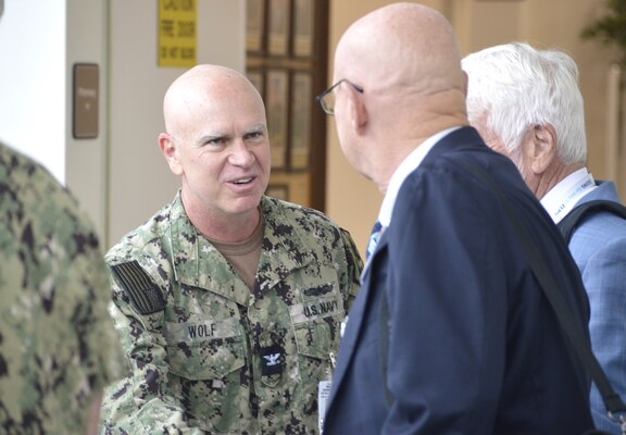 Extending a welcoming hand…Capt. Brandon Wolf, Naval Hospital Bremerton Director for Strategy and Quality Management department head greets The Joint Commission survey team during their official accreditation visit to the command, April 29-May 1, 2025. The Joint Commission survey takes place approximately every three years to inspect a hospital on such demonstrated high standards as patient care, process improvement and professional collaboration. The surveyors evaluated NHB’s compliance with established standards and identified strengths and weaknesses. From directorates to offices to clinics, the visiting survey team evaluated NHB’s policies, procedures and personnel, including reviewing Joint Commission criteria, performing spot inspections, and assessing standard operating procedures, forms, and protocols in place. They also gave credit where credit was due to staff members, processes in place and enacted initiatives. The shared results from The Joint Commission on the visit reflected favorably on NHB (Official Navy photo by Douglas H Stutz, NHB/NMRTC Bremerton public affairs officer).