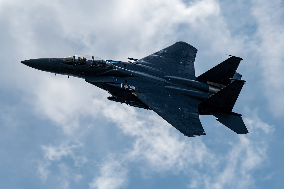 A U.S. Air Force F-15E Strike Eagle does an aerial demonstration during Wings Over Wayne 2025 at Seymour Johnson Air Force Base, North Carolina, May 02, 2025. The event provided an opportunity for the public to connect with the Airmen and experience the capability of the Air Force firsthand. (U.S. Air Force photo by Senior Airman Leighton Lucero)