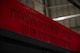 A phrase is displayed on a tool cart used by the 23rd Bomber Generation Squadron during the 1st Quarter Weapons Load Competition at Minot Air Force Base, May 2, 2025. This competition allowed Airmen to show how efficiently and safely they could load inert GBU-31 Joint Direct Attack Munitions onto a B-52H Stratofortress in a high-stress environment. (U.S. Air Force photo by Senior Airman Alyssa Bankston)