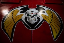 A design is displayed on a tool cart used by the 23rd Bomber Generation Squadron during the 1st Quarter Weapons Load Competition at Minot Air Force Base, May 2, 2025. This competition allowed Airmen to show how efficiently and safely they could load inert GBU-31 Joint Direct Attack Munitions onto a B-52H Stratofortress in a high-stress environment. (U.S. Air Force photo by Senior Airman Alyssa Bankston)