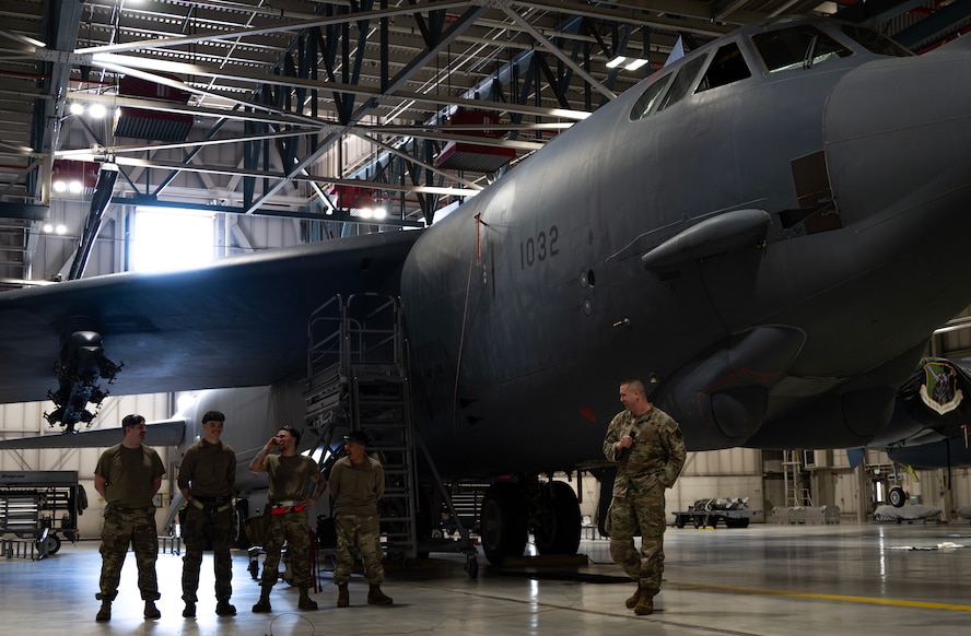 Load crew members from the 69th Bomber Generation Squadron are introduced during the 1st Quarter Weapons Load Competition at Minot Air Force Base, May 2, 2025. Weapons load competitions play a significant role in enhancing mission readiness and strengthening global strike capabilities. (U.S. Air Force photo by Senior Airman Alyssa Bankston)