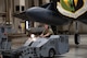 Senior Airman Joshua Boyle, 69th Bomber Generation Squadron load crew member, drives a missile carrier during the 1st Quarter Weapons Load Competition at Minot Air Force Base, May 2, 2025. For the inert munition to be loaded onto the aircraft safely and effectively, the crew must always have precise control over it. (U.S. Air Force photo by Senior Airman Alyssa Bankston)