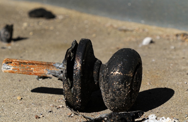 Leftover debris from the Eaton wildfire sitting on the stoop awaiting cleanup.