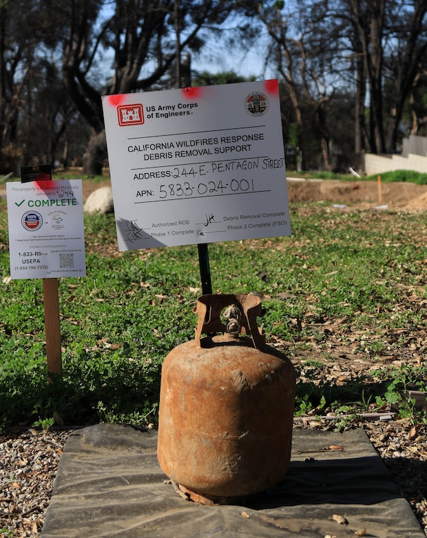 Left over debris from the California wildfires is safely being cleared as vegetation begins to return.