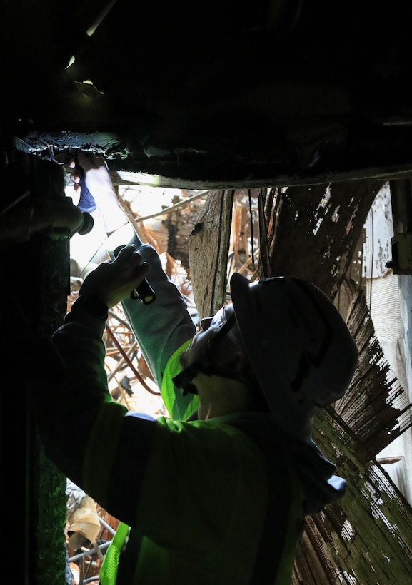 Civil engineer (structural) Ian Buchanan performs a hammer test inside a fire damaged doorway at the Eliot Arts Magnet Academy in Altadena, California. For this test a ringing sound means the structural integrity of the cement is likely still there, and a loud dull thud means it likely has sustained moderate to heavy damage. The Southern California wildfires of January 2025 left much of the school heavily damaged, April 15.

USACE is working in partnership with local, state and the Federal Emergency Management Agency in response to the Southern California Wildfires.