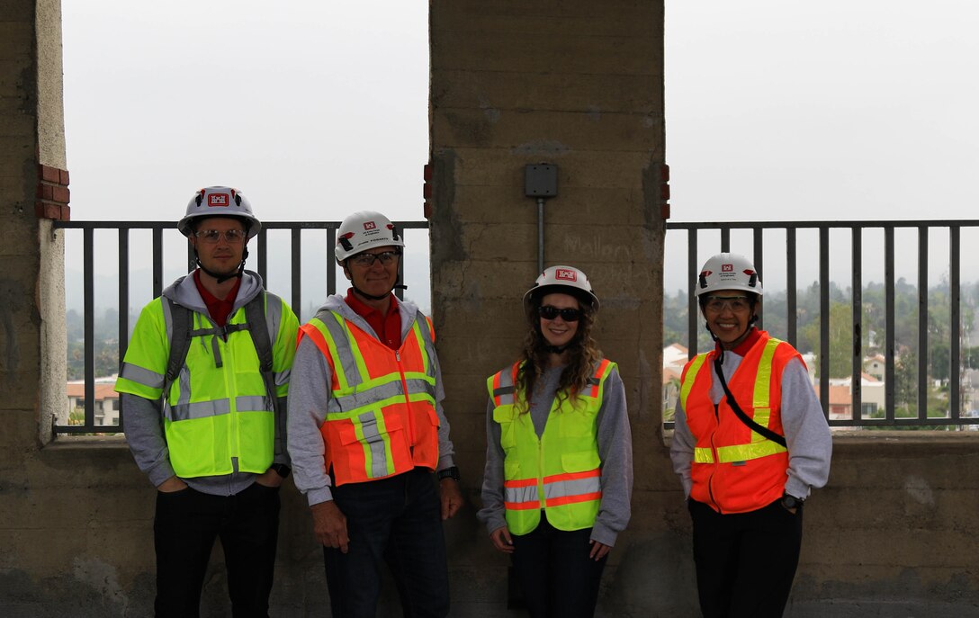 Left to right: Civil engineers (structural) Ian Buchanan, John Fogarty, Kayla Stull, and debris removal subject matter expert Maria de la Torre pause for a moment as they inspect the structural integrity and potential debris removal plans for the tower at the Eliot Arts Magnet Academy in Altadena, California. The school was heavily damaged in the January 2025 Southern California wildfires, April 15.

USACE is working in partnership with local, state and the Federal Emergency Management Agency in response to the Southern California Wildfires.