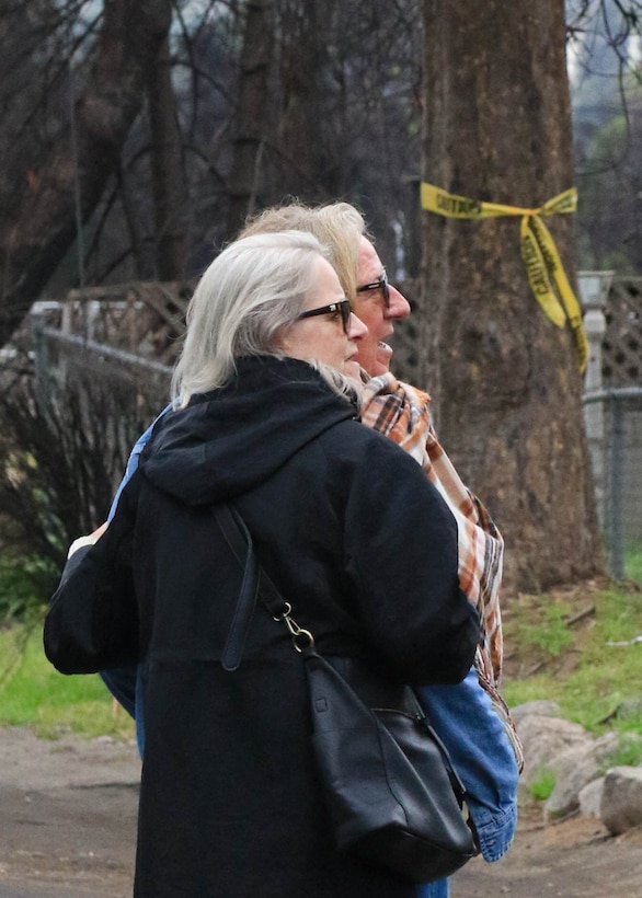 Brian and Pamela Huges of Altadena, California pause for a moment in front of the debris following the Southern California wildfires.

USACE is working in partnership with local, state and the Federal Emergency Management Agency in response to the Southern California Wildfires.