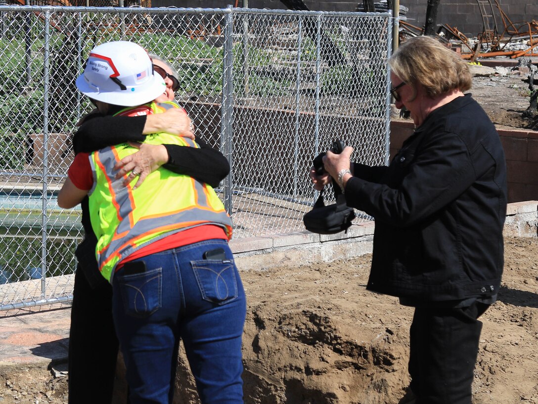 Sarah West of the San Francisco district embraces Pamela Huges of Altadena, California as her husband Brian looks on following the Southern California wildfires.

USACE is working in partnership with local, state and the Federal Emergency Management Agency in response to the Southern California Wildfires.