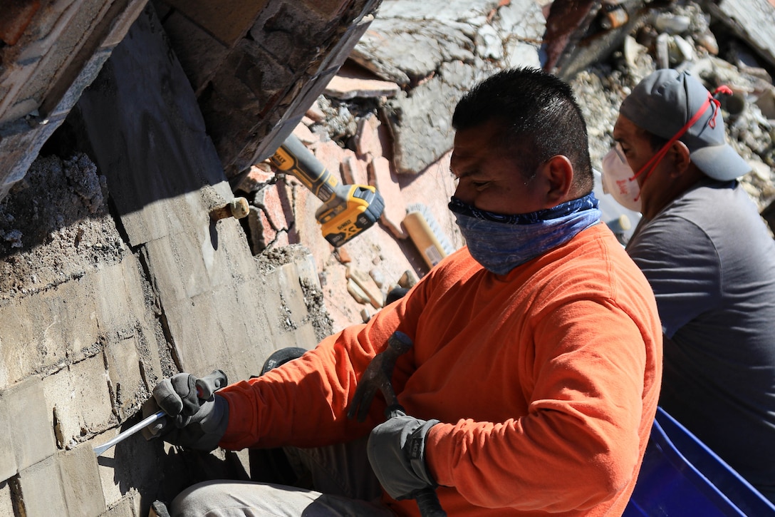 A standing chimney that is due to be knocked down has it's Batchelder tiles removed before workers can knock it down. Removed as a part of the Save The Tiles nonprofit's mission, workers volunteer their time to preserve this piece of LA history.

USACE is working in partnership with local, state and the Federal Emergency Management Agency in response to the Southern California Wildfires.