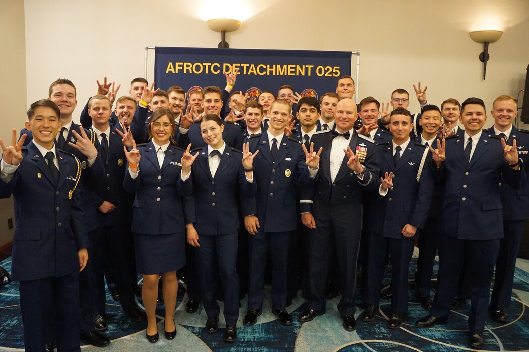 U.S. Air Force Brig. Gen. David Berkland, 56th Fighter Wing commander, poses with Arizona State University Air Force Reserve Officer Training Corps cadets, April 19, 2025, in Mesa, Arizona.