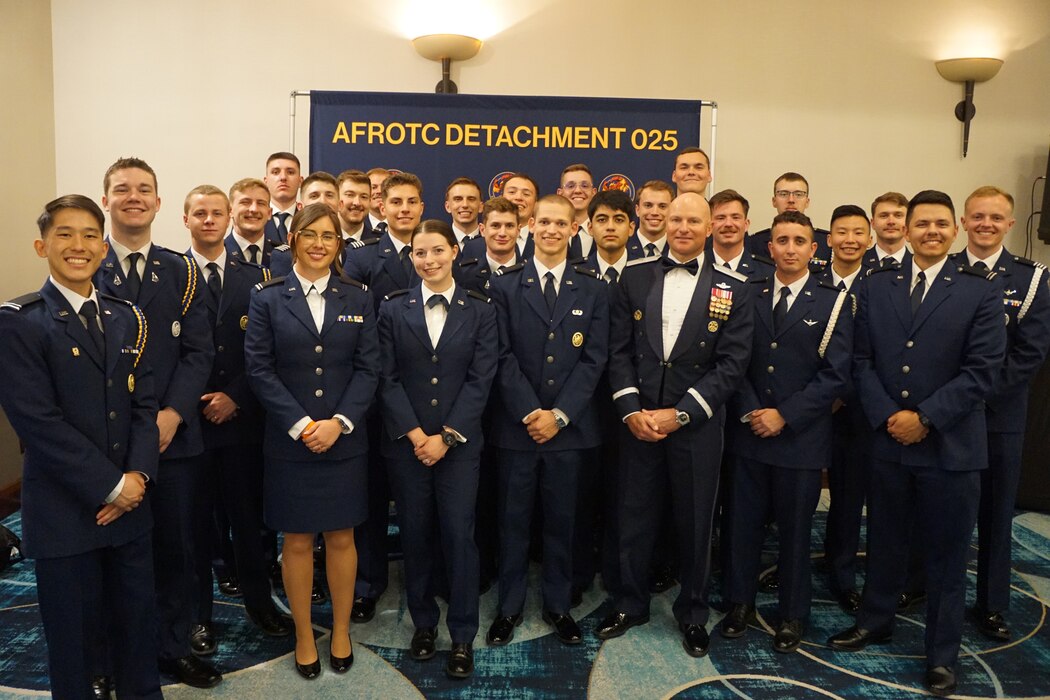 U.S. Air Force Brig. Gen. David Berkland, 56th Fighter Wing commander, poses with Arizona State University Air Force Reserve Officer Training Corps cadets, April 19, 2025, in Mesa, Arizona.