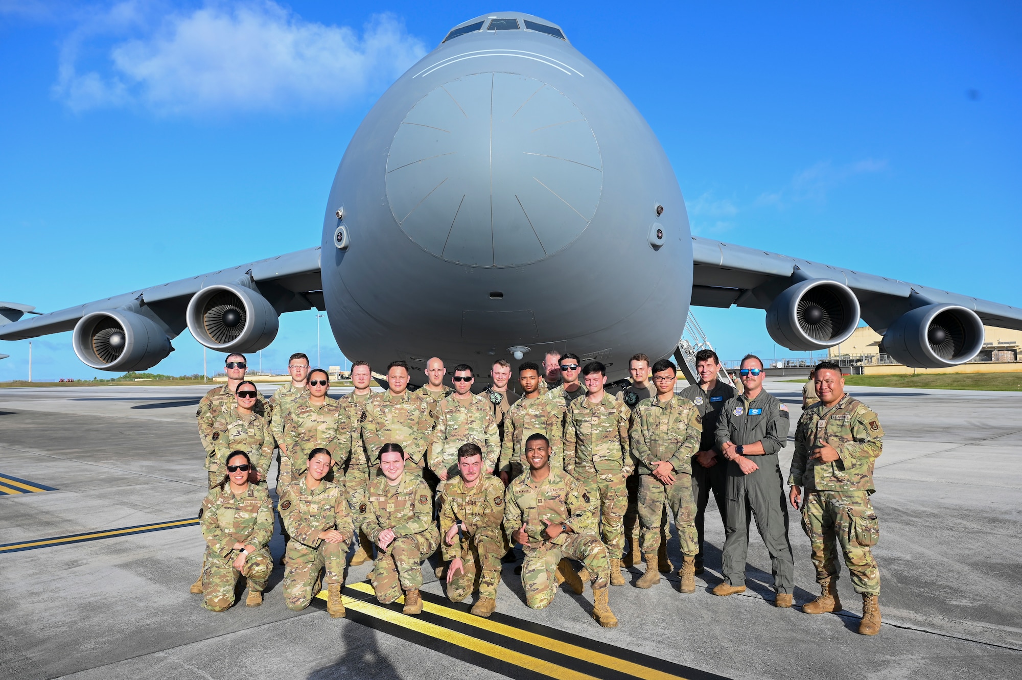 Airmen assigned to the 36th Tactical Advisory Squadron and 436th Airlift Wing pose for a group photo at Andersen Air Force Base, Guam.