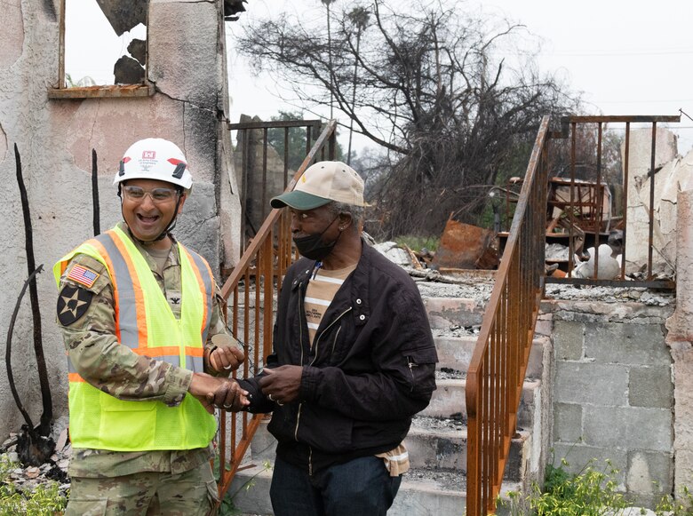 Col. Sonny Avichal, U.S. Army Corps of Engineers Emergency Field Office–Eaton commander presents a poker chip and decal to USACE employee Darius Wallace from the EFO-Eaton wildfire team.

USACE is working in partnership with local, state and the Federal Emergency Management Agency in response to the Southern California Wildfires.