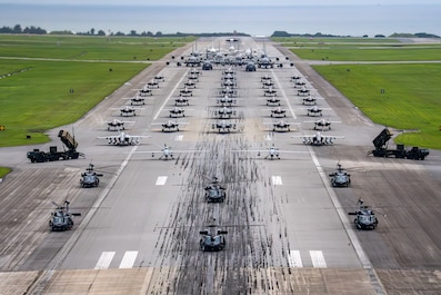 KADENA AIR BASE, Japan (May 5, 2025) — U.S. Air Force and U.S. Navy aircraft, along with U.S. Army Patriot missile batteries line up on the runway for an elephant walk during a routine operational readiness exercise at Kadena Air Base, Japan, May 6,...