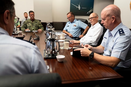 From right to center, U.S. Air Force Maj. Gen. Joel Carey,, chief of staff of U.S. Indo-Pacific Command, New Zealand Secretary of Defence Brook Barrington, and Chief of Defence Force Air Marshal Tony Davies, hold a group discussion at USINDOPACOM headquarters on Camp H. M. Smith in Honolulu, May 5, 2025.