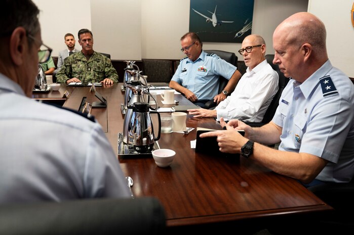 From right to center, U.S. Air Force Maj. Gen. Joel Carey,, chief of staff of U.S. Indo-Pacific Command, New Zealand Secretary of Defence Brook Barrington, and Chief of Defence Force Air Marshal Tony Davies, hold a group discussion at USINDOPACOM headquarters on Camp H. M. Smith in Honolulu, May 5, 2025.