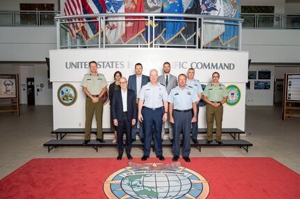 U.S. Air Force Maj. Gen. Joel Carey, front center, chief of staff of U.S. Indo-Pacific Command joins New Zealand Secretary of Defence Brook Barrington, front left, and Chief of Defence Force Air Marshal Tony Davies, front right, for a group photo at USINDOPACOM headquarters on Camp H. M. Smith in Honolulu, May 5, 2025.