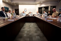 U.S. Air Force Maj. Gen. Joel Carey, center right, chief of staff of U.S. Indo-Pacific Command, New Zealand Secretary of Defence Brook Barrington, center, and Chief of Defence Force Air Marshal Tony Davies, center left, hold a group discussion at USINDOPACOM headquarters on Camp H. M. Smith in Honolulu, May 5, 2025.