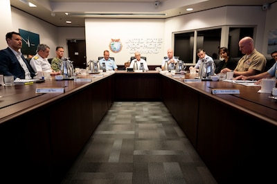 U.S. Air Force Maj. Gen. Joel Carey, center right, chief of staff of U.S. Indo-Pacific Command, New Zealand Secretary of Defence Brook Barrington, center, and Chief of Defence Force Air Marshal Tony Davies, center left, hold a group discussion at USINDOPACOM headquarters on Camp H. M. Smith in Honolulu, May 5, 2025.