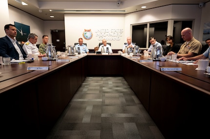 U.S. Air Force Maj. Gen. Joel Carey, center right, chief of staff of U.S. Indo-Pacific Command, New Zealand Secretary of Defence Brook Barrington, center, and Chief of Defence Force Air Marshal Tony Davies, center left, hold a group discussion at USINDOPACOM headquarters on Camp H. M. Smith in Honolulu, May 5, 2025.