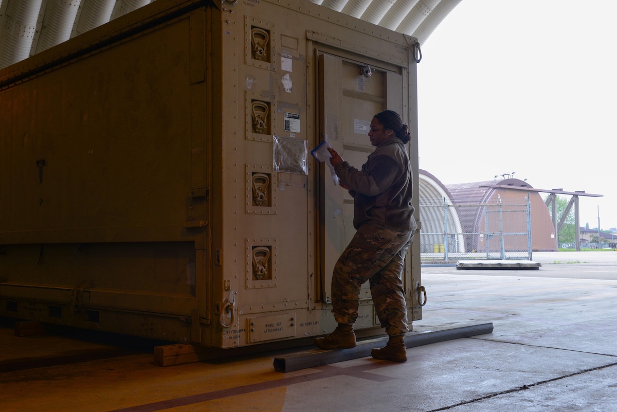 U.S. Air Force Staff Sgt. Kieara Obama, 51st Fighter Wing advanced programs office logistics manager, inspects a deployable debrief facility at Osan Air Base, Republic of Korea, May 5, 2025. As the logistics manager that coordinates use of the DDFs, Obama has enabled combat air power generation since joining the APO gaining her recognition as Mustang of the Week. (U.S. Air Force photo by Staff Sgt. Kahdija Slaughter)