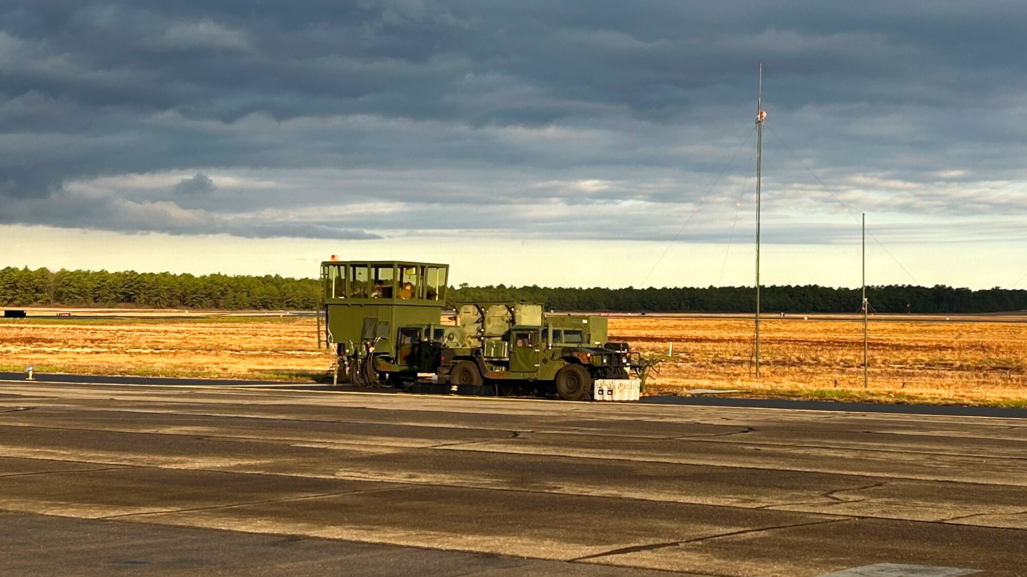 The Mobile Special Navigational Aid-7 tower is deployed and undergoes pre-operational inspection at Lakehurst’s Maxwell Field at Joint Base McGuire-Dix-Lakehurst, N.J., April 7, 2025. In a display of Total Force Integration, active-duty Airmen, Sailors and Air National Guard teams successfully deployed and activated the MSN-7 tower at Lakehurst’s Maxwell Field while the main tower underwent refurbishment allowing for uninterrupted support to mission readiness and operational capability. (U.S. Air Force photo by Monty Crawford)