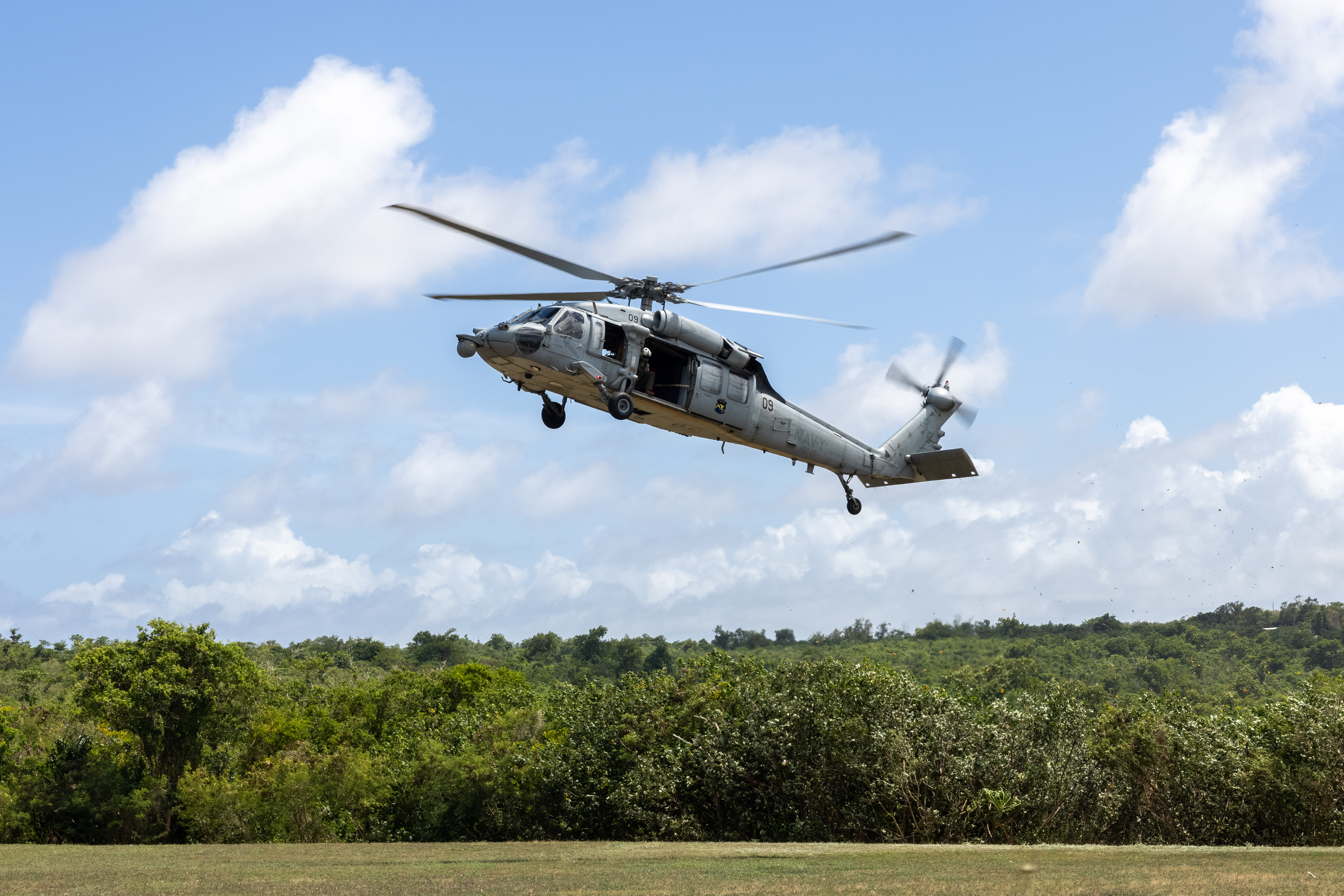 A U.S. Navy MH-60 Sea Hawk with Helicopter Sea Combat Squadron 25, lands in the “Mariana Crow” landing zone at Skaggs Urban Training Complex, Marine Corps Base Camp Blaz, Guam, May 6, 2025. HSC-25 conducted flight operations over the Skaggs Urban Training Complex to survey available landing zones during training. (U.S. Marine Corps photo by Cpl. Ryan Little)