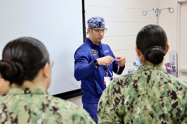 Hospital nurses and corpsmen assigned to Navy Medicine Readiness and Training Command (NMRTC) Twentynine Palms participate in hands-on training during the Annual Nursing and Corpsmen Skills Fair, held April 29–30. The two-day event focused on sharpening essential medical skills such as blood administration, high-level disinfection, suicide screening, and medication delivery using newly upgraded Alaris infusion pumps. Designed in response to regulatory standards and command-wide data trends, the fair emphasized readiness, patient safety, and teamwork through simulation-based learning and collaborative training sessions. The training ensures that Navy medical personnel remain highly skilled, adaptable, and prepared to deliver high-quality care in both military treatment facilities and deployed environments (U.S. Navy photo by Christopher C. Jones, NHTP/NMRTC Twentynine Palms public affairs officer).