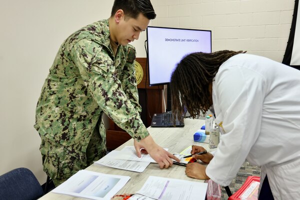 Hospital nurses and corpsmen assigned to Navy Medicine Readiness and Training Command (NMRTC) Twentynine Palms participate in hands-on training during the Annual Nursing and Corpsmen Skills Fair, held April 29–30. The two-day event focused on sharpening essential medical skills such as blood administration, high-level disinfection, suicide screening, and medication delivery using newly upgraded Alaris infusion pumps. Designed in response to regulatory standards and command-wide data trends, the fair emphasized readiness, patient safety, and teamwork through simulation-based learning and collaborative training sessions. The training ensures that Navy medical personnel remain highly skilled, adaptable, and prepared to deliver high-quality care in both military treatment facilities and deployed environments (U.S. Navy photo by Christopher C. Jones, NHTP/NMRTC Twentynine Palms public affairs officer).