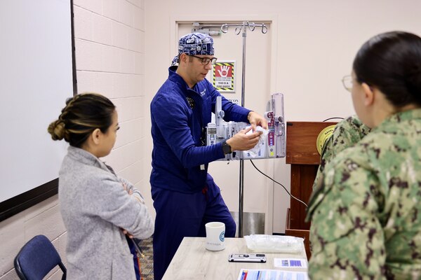 Hospital nurses and corpsmen assigned to Navy Medicine Readiness and Training Command (NMRTC) Twentynine Palms participate in hands-on training during the Annual Nursing and Corpsmen Skills Fair, held April 29–30. The two-day event focused on sharpening essential medical skills such as blood administration, high-level disinfection, suicide screening, and medication delivery using newly upgraded Alaris infusion pumps. Designed in response to regulatory standards and command-wide data trends, the fair emphasized readiness, patient safety, and teamwork through simulation-based learning and collaborative training sessions. The training ensures that Navy medical personnel remain highly skilled, adaptable, and prepared to deliver high-quality care in both military treatment facilities and deployed environments (U.S. Navy photo by Christopher C. Jones, NHTP/NMRTC Twentynine Palms public affairs officer).
