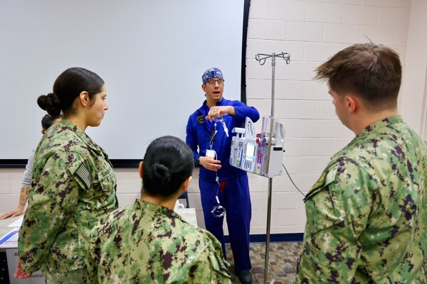 Hospital nurses and corpsmen assigned to Navy Medicine Readiness and Training Command (NMRTC) Twentynine Palms participate in hands-on training during the Annual Nursing and Corpsmen Skills Fair, held April 29–30. The two-day event focused on sharpening essential medical skills such as blood administration, high-level disinfection, suicide screening, and medication delivery using newly upgraded Alaris infusion pumps. Designed in response to regulatory standards and command-wide data trends, the fair emphasized readiness, patient safety, and teamwork through simulation-based learning and collaborative training sessions. The training ensures that Navy medical personnel remain highly skilled, adaptable, and prepared to deliver high-quality care in both military treatment facilities and deployed environments (U.S. Navy photo by Christopher C. Jones, NHTP/NMRTC Twentynine Palms public affairs officer).