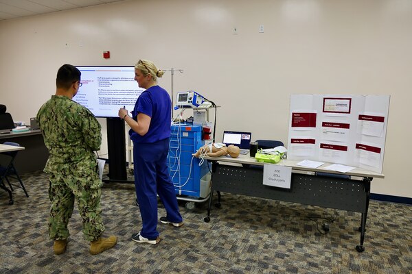 Hospital nurses and corpsmen assigned to Navy Medicine Readiness and Training Command (NMRTC) Twentynine Palms participate in hands-on training during the Annual Nursing and Corpsmen Skills Fair, held April 29–30. The two-day event focused on sharpening essential medical skills such as blood administration, high-level disinfection, suicide screening, and medication delivery using newly upgraded Alaris infusion pumps. Designed in response to regulatory standards and command-wide data trends, the fair emphasized readiness, patient safety, and teamwork through simulation-based learning and collaborative training sessions. The training ensures that Navy medical personnel remain highly skilled, adaptable, and prepared to deliver high-quality care in both military treatment facilities and deployed environments (U.S. Navy photo by Christopher C. Jones, NHTP/NMRTC Twentynine Palms public affairs officer).