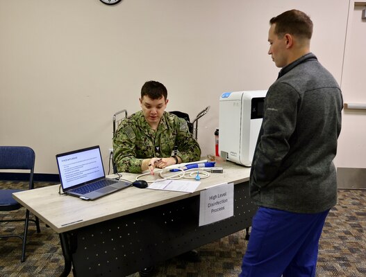 Hospital nurses and corpsmen assigned to Navy Medicine Readiness and Training Command (NMRTC) Twentynine Palms participate in hands-on training during the Annual Nursing and Corpsmen Skills Fair, held April 29–30. The two-day event focused on sharpening essential medical skills such as blood administration, high-level disinfection, suicide screening, and medication delivery using newly upgraded Alaris infusion pumps. Designed in response to regulatory standards and command-wide data trends, the fair emphasized readiness, patient safety, and teamwork through simulation-based learning and collaborative training sessions. The training ensures that Navy medical personnel remain highly skilled, adaptable, and prepared to deliver high-quality care in both military treatment facilities and deployed environments (U.S. Navy photo by Christopher C. Jones, NHTP/NMRTC Twentynine Palms public affairs officer).