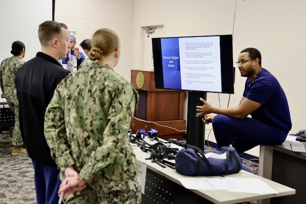 Hospital nurses and corpsmen assigned to Navy Medicine Readiness and Training Command (NMRTC) Twentynine Palms participate in hands-on training during the Annual Nursing and Corpsmen Skills Fair, held April 29–30. The two-day event focused on sharpening essential medical skills such as blood administration, high-level disinfection, suicide screening, and medication delivery using newly upgraded Alaris infusion pumps. Designed in response to regulatory standards and command-wide data trends, the fair emphasized readiness, patient safety, and teamwork through simulation-based learning and collaborative training sessions. The training ensures that Navy medical personnel remain highly skilled, adaptable, and prepared to deliver high-quality care in both military treatment facilities and deployed environments (U.S. Navy photo by Christopher C. Jones, NHTP/NMRTC Twentynine Palms public affairs officer).