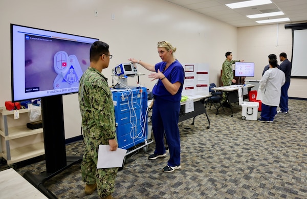 Hospital nurses and corpsmen assigned to Navy Medicine Readiness and Training Command (NMRTC) Twentynine Palms participate in hands-on training during the Annual Nursing and Corpsmen Skills Fair, held April 29–30. The two-day event focused on sharpening essential medical skills such as blood administration, high-level disinfection, suicide screening, and medication delivery using newly upgraded Alaris infusion pumps. Designed in response to regulatory standards and command-wide data trends, the fair emphasized readiness, patient safety, and teamwork through simulation-based learning and collaborative training sessions. The training ensures that Navy medical personnel remain highly skilled, adaptable, and prepared to deliver high-quality care in both military treatment facilities and deployed environments (U.S. Navy photo by Christopher C. Jones, NHTP/NMRTC Twentynine Palms public affairs officer).